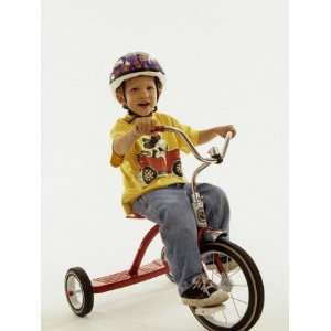  4 Year Old Boy Posing on His Tricycle, New York, New York 