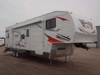   AND FULLY LOADED  2012 WILDWOOD 32SRV 5TH WHEEL TOY HAULER  