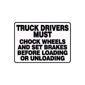 TRUCK DRIVERS MUST CHOCK WHEELS AND SET BRAKES BEFORE 