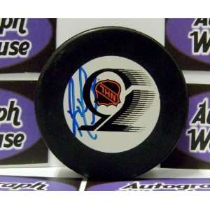  Reggie Leach Autographed Hockey Puck (NHL 75th Aniv 