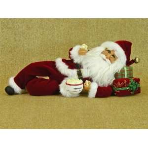 Santa Claus by Karen Didion originals laying Santa Claus figurine with 