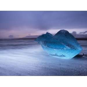 Translucent Blue Iceberg Washed Ashore on Breidamerkursandur Black 