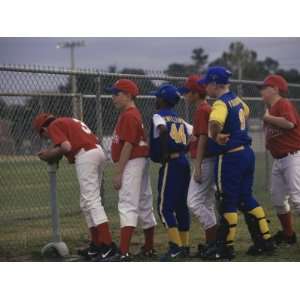Side Profile of a Group of Boys on a Baseball Team Standing in a Row 