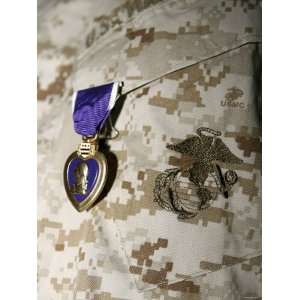  A Soldier Wears His Purple Heart on His Digital Camouflage 