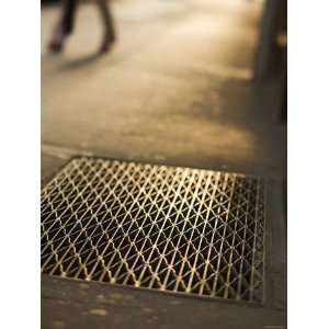  Selective Focus of an Industrial Metal Grate on a City 