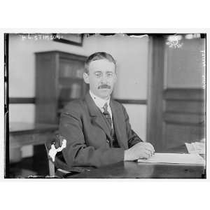  H.L. Stimson at desk writing