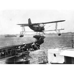 O2U 4 Corsair Floatplane Being Catapulted From the USS Houston Circa 