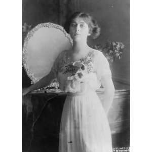   Olga Roosevelt, three quarter length portrait, standing, facing sligh