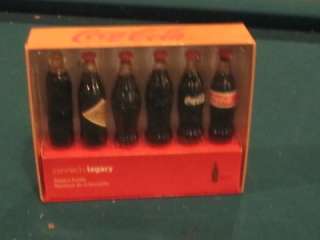 Coca Cola Coke Minature Evolution of bottle   6 bottle display  