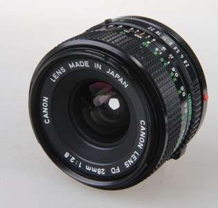 YOU ARE LOOKING AT A PREOWNED USED CANON 28MM F2.8 LENS SERIAL 