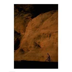  Silhouette of a man mountain biking, Utah, USA Poster (18 