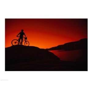   with his mountain bike, Lake Powell, Utah, USA Poster (24.00 x 18.00
