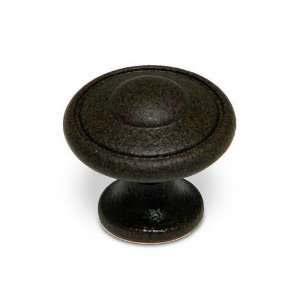 Village expression   1 3/16 diameter knob with grooved edge in antiqu