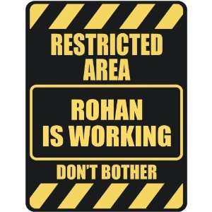   RESTRICTED AREA ROHAN IS WORKING  PARKING SIGN