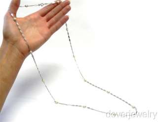 This elegant estate chain necklace is crafted in solid 18K white gold 