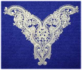   lace with intense stitching. Beautiful scroll work, excellent quality