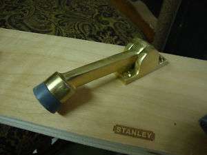 Stanley 4 Architectural Grade door holder Bright Brass  