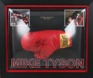   hand signed mike tyson glove that has been expertly framed in a dome