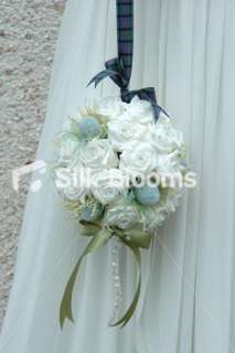 Be a different bride with this gorgeous white and aqua kissing ball .