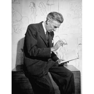  Cartoonist James Thurber Posing with His Work Stretched 