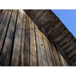  Close up of a Weathered Wooden Shed Against Blue Sky 