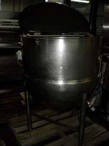 Listed is a GROEN MFG STAINLESS STEEL JACKETED KETTLE. This kettle is 