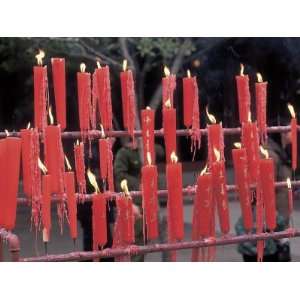  Lit Red Candles Burning at Religious Shrine in China 