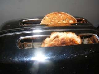 Vintage Toastmaster Chrome+Bakelite toaster Auto Pop up bottom flips 