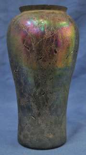 We have on offer a large irridescent glass vase, with a textured 